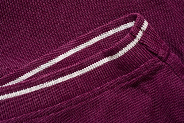 Purple polo shirt texture, cotton fabric. Textile background