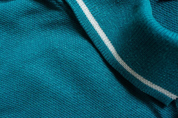 Zielona koszulka polo tekstura, tkanina bawełniana. Tło tekstylne — Zdjęcie stockowe