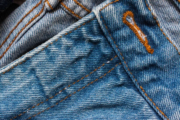 Denim jeans textuur, katoenen stof. Zak en klinknagel. Textiel ba — Stockfoto