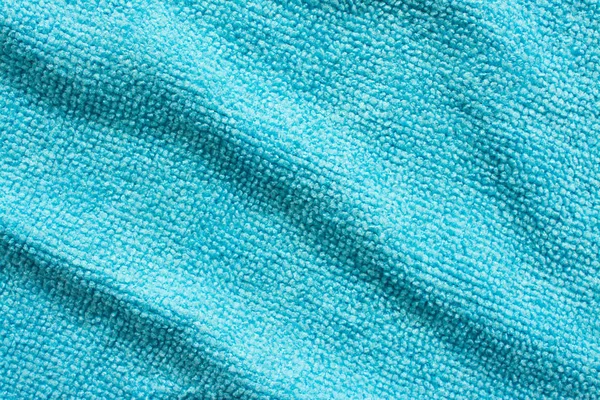 Superficie de tela de microfibra azul, fondo de patrón macro textil — Foto de Stock