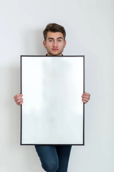 Young Man Holding Banner White Background — Stock Photo, Image