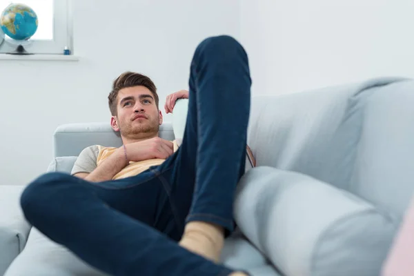 Relaxed Man Resting Lying Couch Living Room — 图库照片