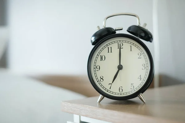Close up alarm clock on blur background with copy space for you — Stock Photo, Image