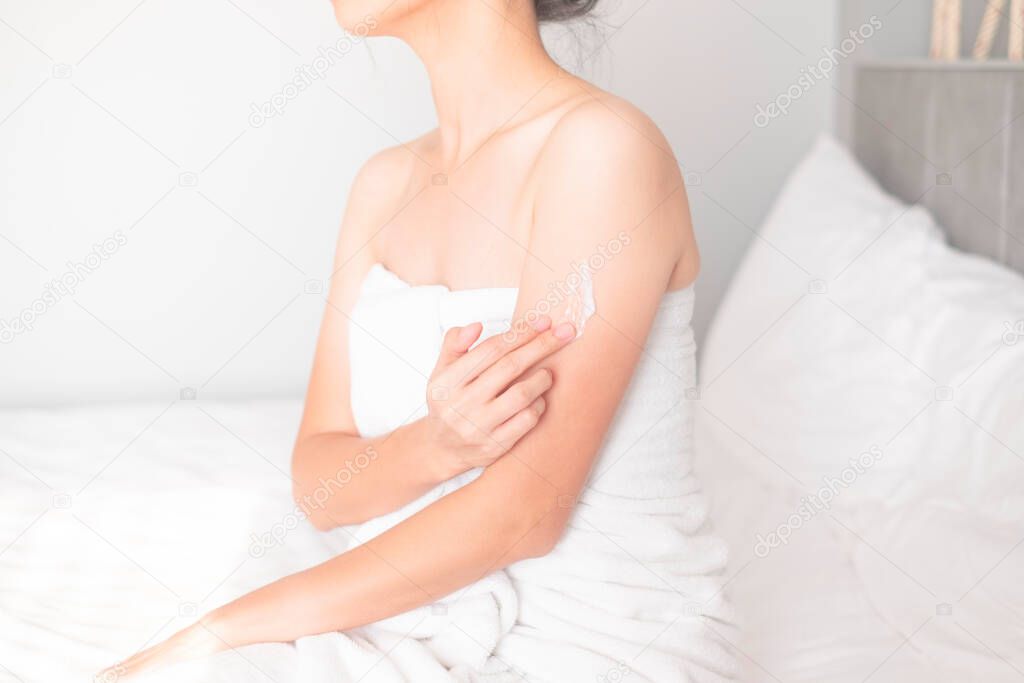 Woman applying arm cream,lotion , Hygiene skin body care concept