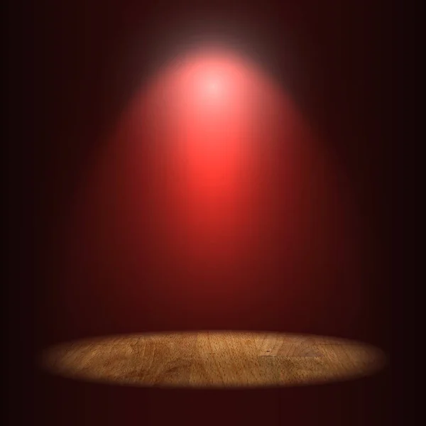 Spot illuminato su un tavolo di legno vuoto su sfondo parete rosso scuro con riflettori, piani di lavoro zona illuminata, concentrarsi su tavolo — Foto Stock