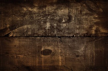 Koyu rustik altın tahta arka plan, eski yaldızlı üst masa dokusu. Vintage arka plan. Ahşap grunge doku, kahverengi altın ahşap masaüst görünümü. Görüntü ürünü için şablon