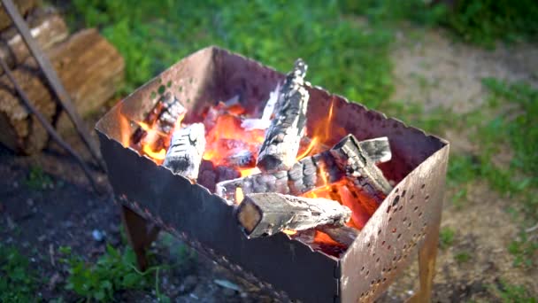 Mangal grill cooked on fire ignited embers burning embers Hot summer outdoors — Stock Video