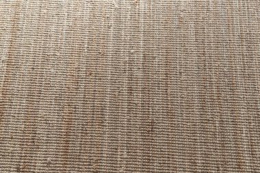 Dokuma doğal lif halı dokusu arkaplanı. Ev iç mimarisi, dekorasyon ve tasarım için çevre dostu el yapımı halı yüzeyi ayrıntıları.