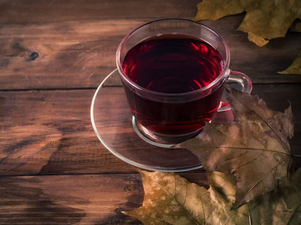 Red Tea Autumn Leaves Background Old Dark Wood Planks — Stock Photo, Image