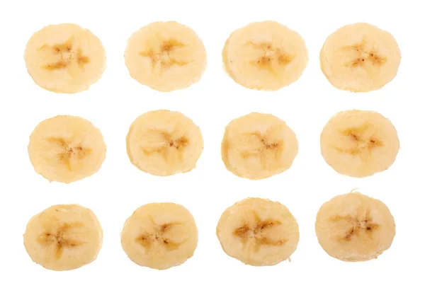 Banana em fatias isoladas sobre fundo branco. Vista superior. Depósito plano — Fotografia de Stock