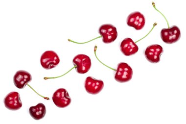 Tatlı kırmızı kiraz kopya alanı metniniz için beyaz zemin üzerine izole. Üstten görünüm. Düz yatıyordu desen