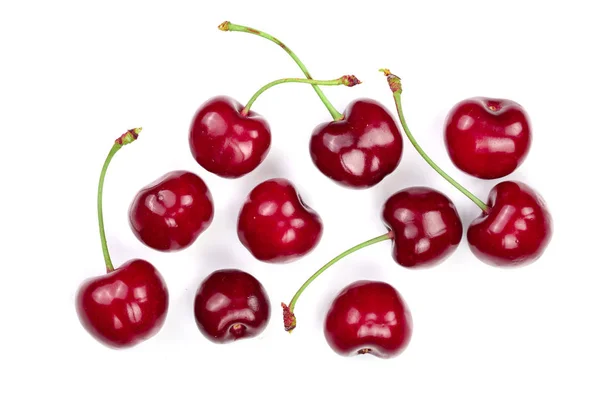 Sweet red cherries isolated on white background. Top view. Flat lay pattern — Stock Photo, Image