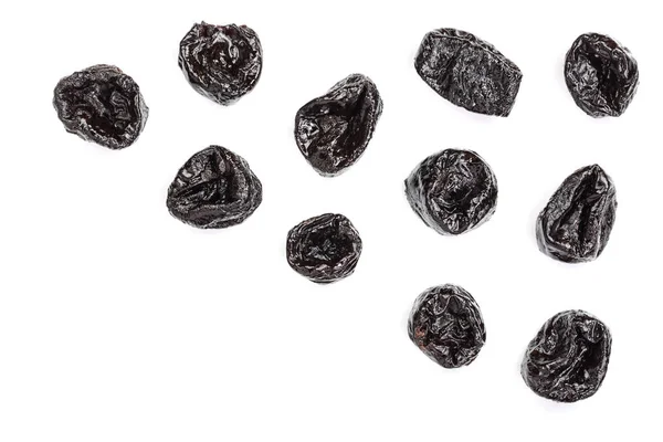 Dried plum - prunes isolated on a white background with copy space for your text. Top view. Flat lay — Stock Photo, Image