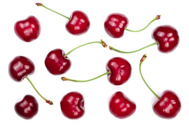 Beyaz arka plan üzerinde izole tatlı kırmızı kiraz. Üstten görünüm. Düz yatıyordu desen