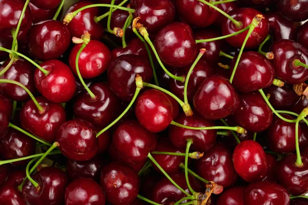Fondo de cerezas rojas maduras. Alimentación saludable. La textura de las bayas —  Fotos de Stock