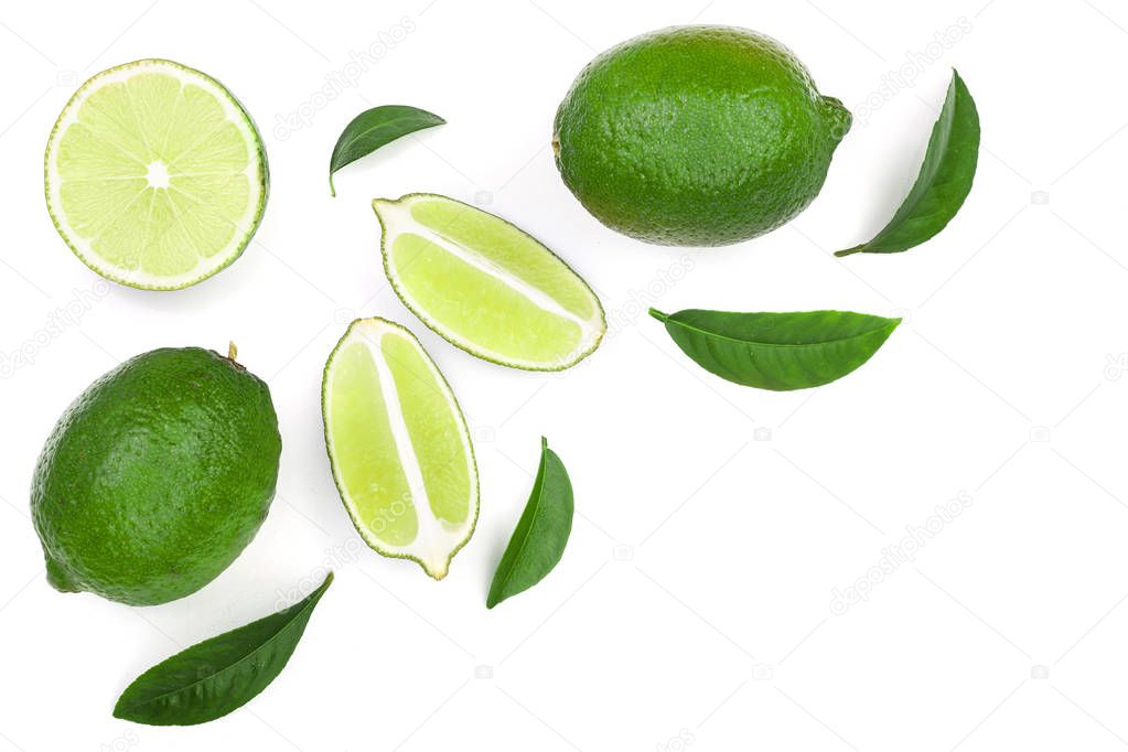 sliced lime vith leaves isolated on white background with copy space for your text. Top view. Flat lay pattern