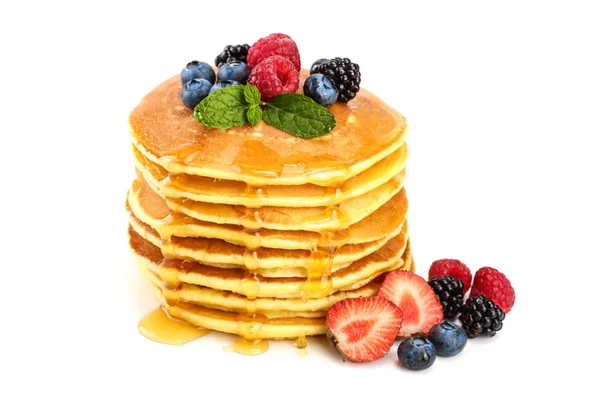 Pancakes stack with different berries and honey isolated on white background — Stock Photo, Image