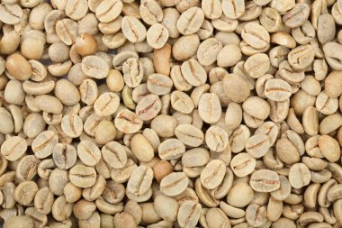 yeşil kahve çekirdekleri arka plan kapatın. Üstten görünüm