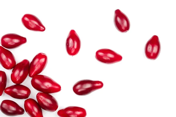 Red berries of cornel or dogwood isolated on white background. Top view. Flat lay — Stock Photo, Image