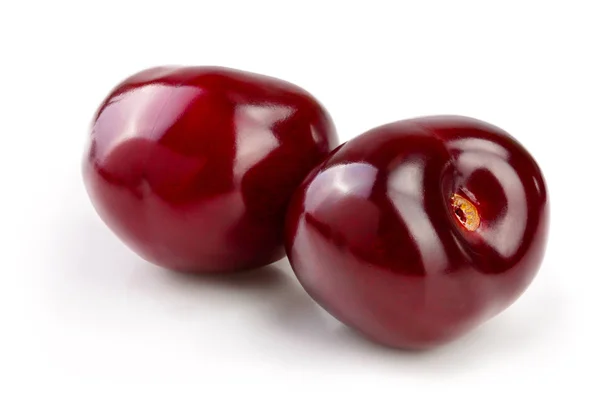 Süße rote Kirschen isoliert auf weißem Hintergrund Makro — Stockfoto