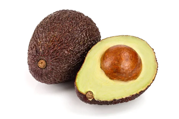 Avocado und halb isoliert auf weißem Hintergrund — Stockfoto