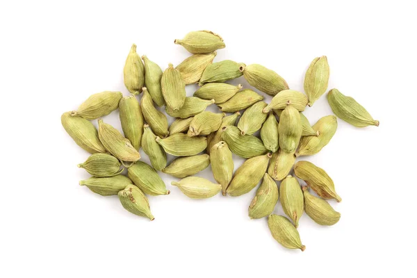Green cardamom seeds isolated on white background. Top view. Flat lay — Stock Photo, Image