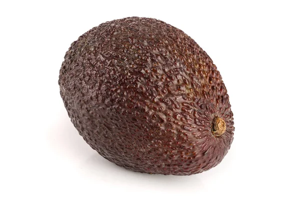 Целый авокадо изолирован на белом фоне — стоковое фото