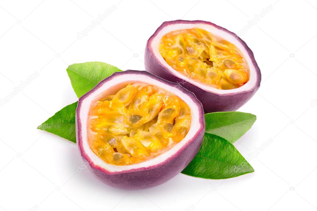 half of passion fruits with leaves isolated on white background. Isolated maracuya