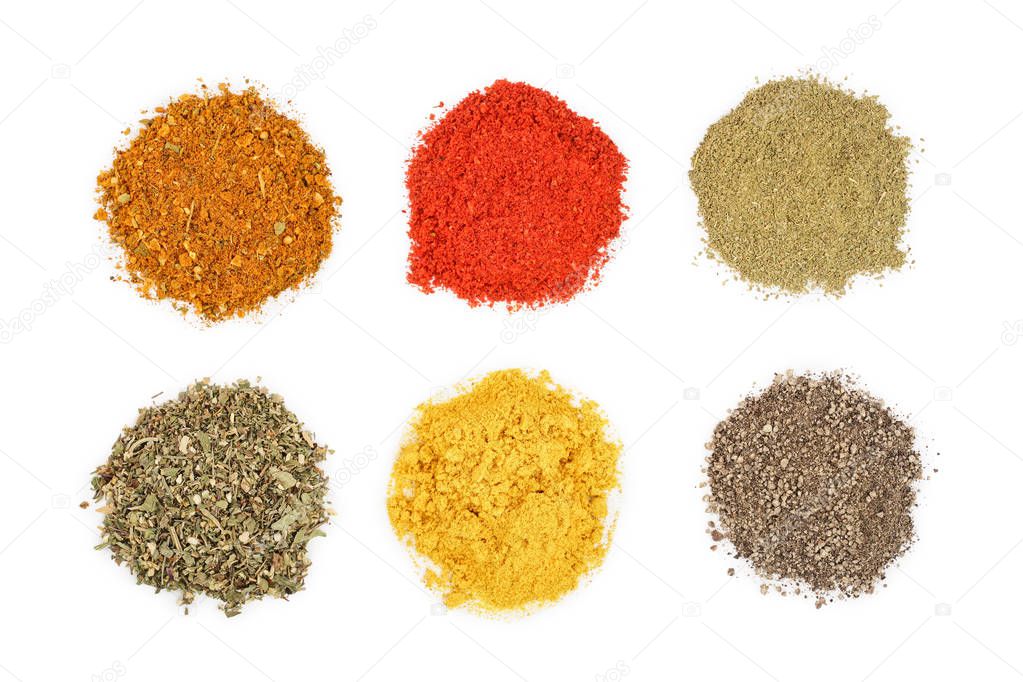 mix of spices isolated on a white background. Top view. Flat lay. Set or collection