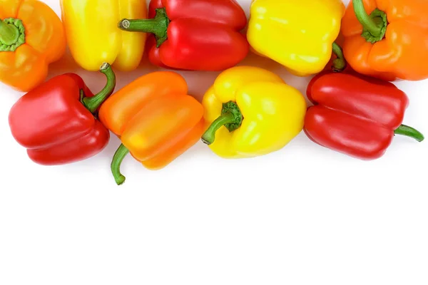 yellow orange and red sweet bell pepper isolated on white background with copy space for your text. Top view. Flat lay