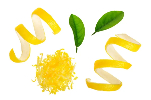 Лимонная кожура и цедра на белом фоне. Здоровое питание — стоковое фото