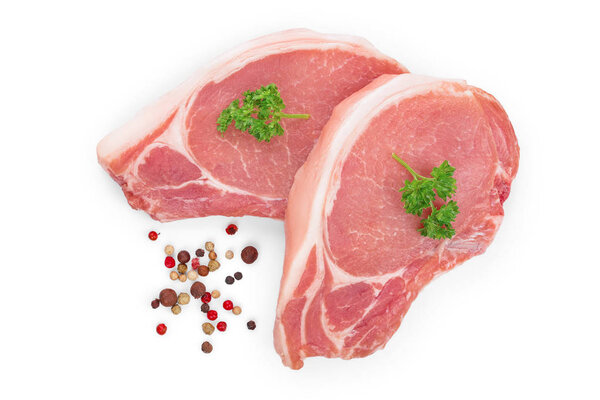 sliced raw pork meat with parsley isolated on white background. Top view. Flat lay