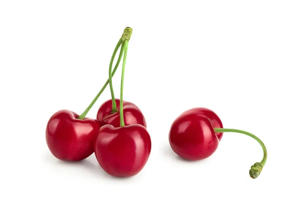 Słodkie wiśnie czerwony na białym tle na białym tle makro — Zdjęcie stockowe