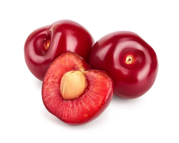 Cherry met halve close-up geïsoleerd op witte achtergrond, — Stockfoto
