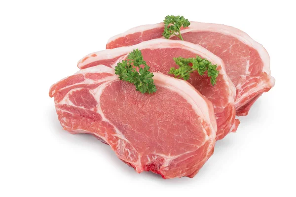 Carne de cerdo cruda en rodajas con perejil aislado sobre fondo blanco —  Fotos de Stock