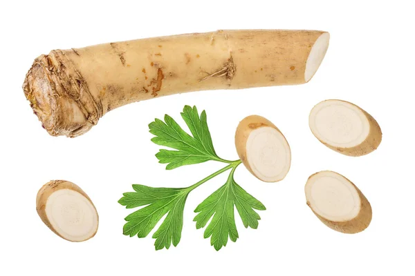 Horseradish root with slices and parsley isolated on white background. Top view. Flat lay — Stock Photo, Image