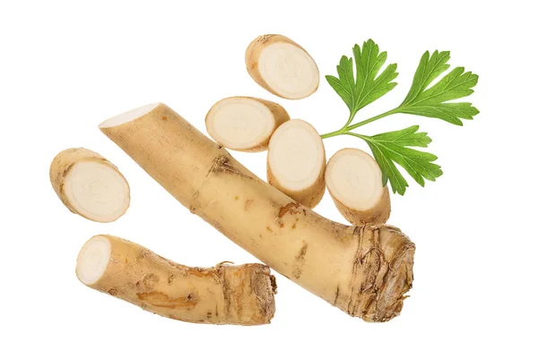 Horseradish root with slices and parsley isolated on white background. Top view. Flat lay — Stock Photo, Image