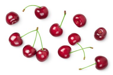 Kırpma yolu ile beyaz zemin üzerinde izole kırmızı tatlı kiraz. Üst Manzara. Düz yatıyordu