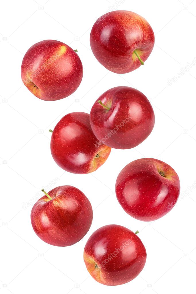 falling Red apple slices isolated on white background,