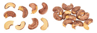 Beyaz arka planda kabuklu kaju fıstığı yığını. Üst Manzara. Düz yatıyordu.