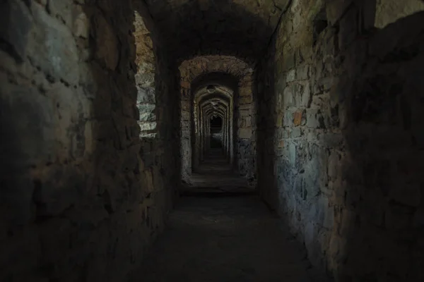 dark scary dark corridor underground path way of ancient fortress