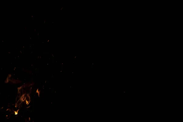 Языки Пламени Движении Блестками Простом Черном Фоне Пустое Пространство Копирования — стоковое фото