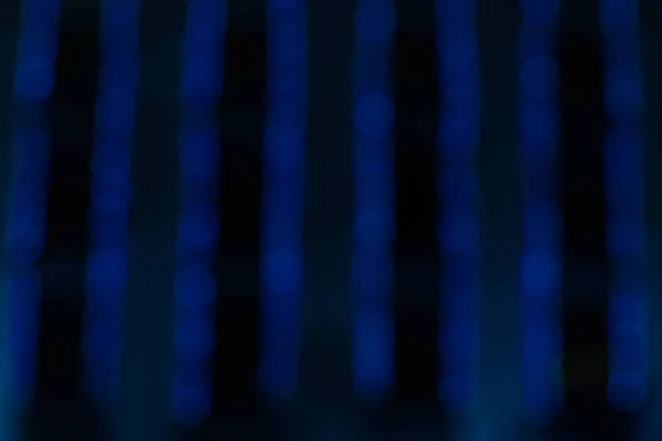 Líneas Iluminación Bokeh Azul Objeto Decoración Guirnalda Sobre Fondo Oscuro — Foto de Stock