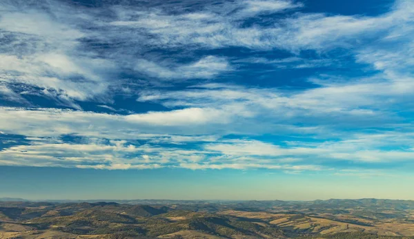 panorama aerial landscape photography of horizontal view on highland gorgeous hills and vivid blue sky white clouds background, wonderful planet Earth concept picture with empty copy space for text