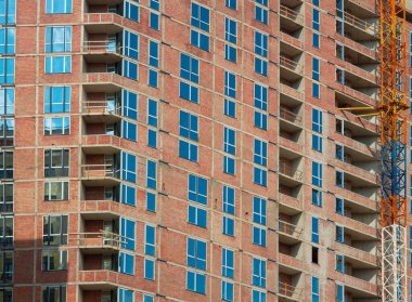 Bitmemiş tuğla bina dış cephe inşaat arka planı şehir konsept görünümünü yeniden inşa ediyor