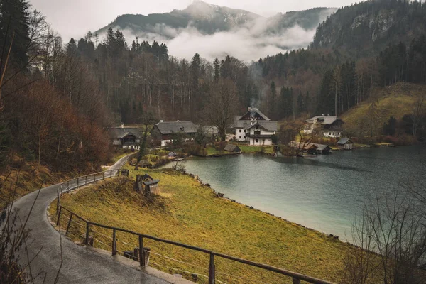 autumn village poor landmark scenic view of depressive October colors and rainy weather day time near mountain forest nature scenic environment space