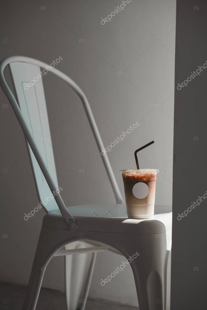 Ice Coffee on take away cup with Empty label for insert logo and graphic mockup template.