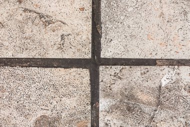 Bir koyu mavi fissür gres dört bölmeleri arasında ile doldurma. Bir fotoğraf kapatın. Benzersiz bir arka plan.