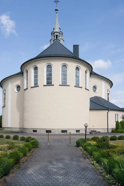 Church dedicated to the Immaculate Heart of Mary in the city of Kolonowskie in the Opolskie Voivodeship. Built in 1948-1954. View of the church from the back. Poland, Europe.