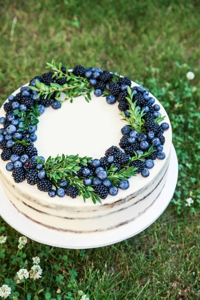Summer berry cake with blueberries and blackberries